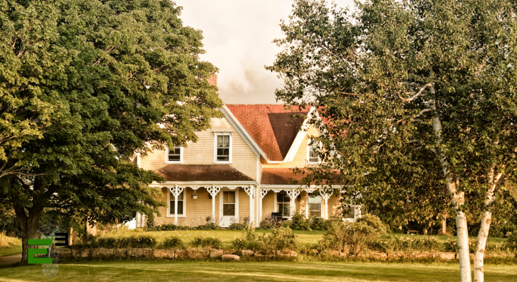 A house being naturally cooled by the shade of trees and plants.